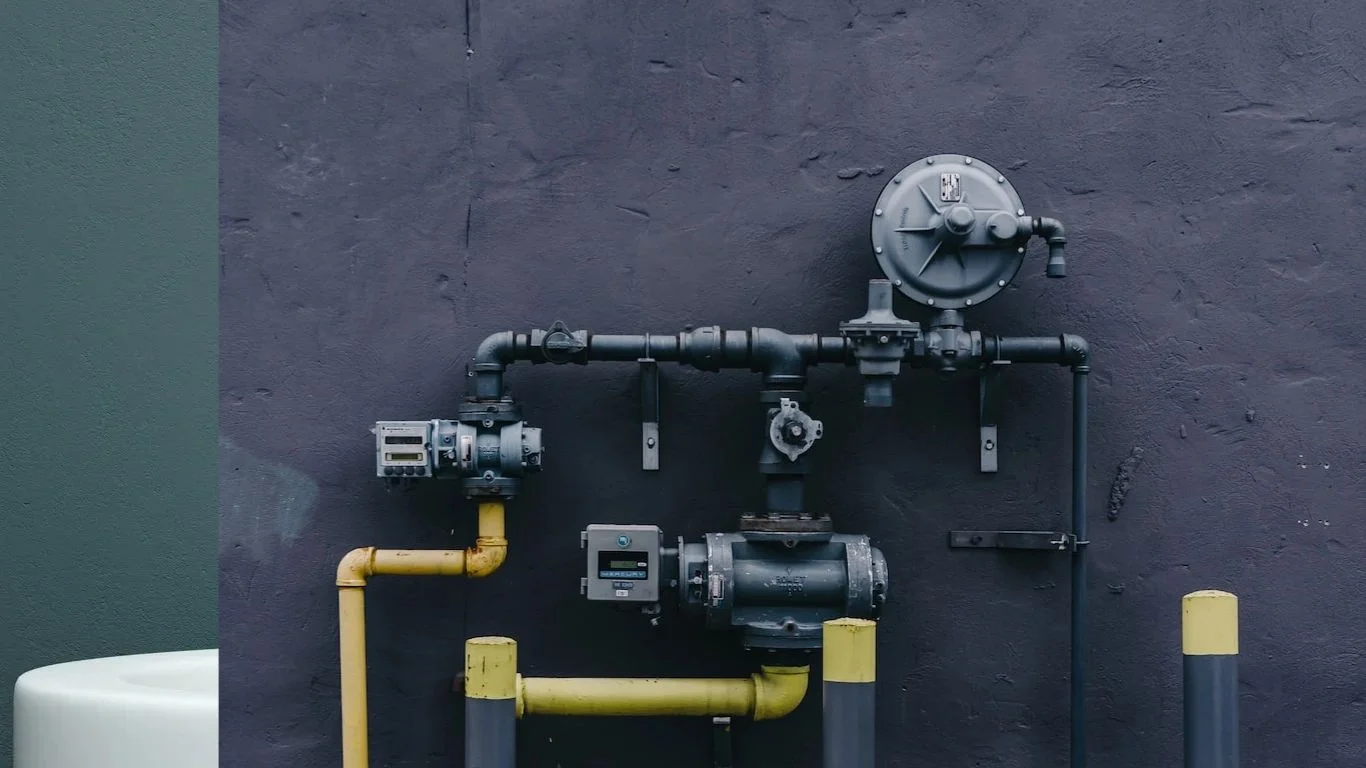 Gas meter, regulator, and connected piping