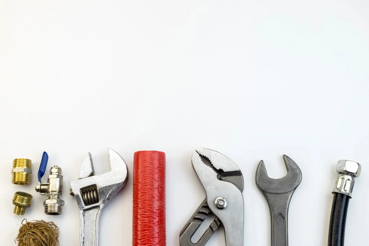 Plumbing tools and brass fittings